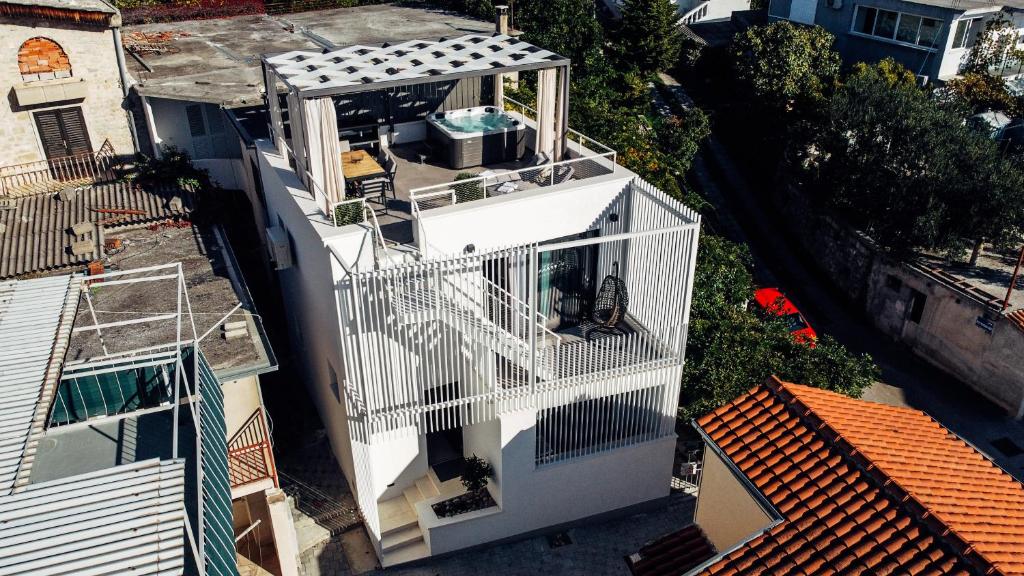 an overhead view of a white house with a balcony at Villa Jadran in Promajna