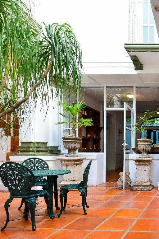 Patio nebo venkovní prostory v ubytování Garlands Del Rio Riverside Boutique Hotel