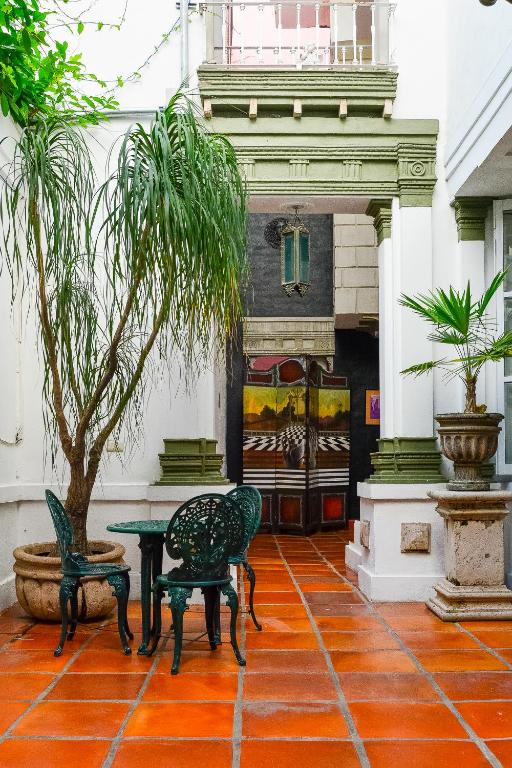 Balkón nebo terasa v ubytování Garlands Del Rio Riverside Boutique Hotel