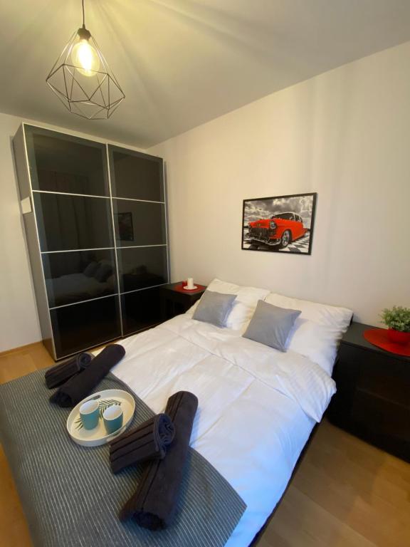 Кровать или кровати в номере Apartament Nature