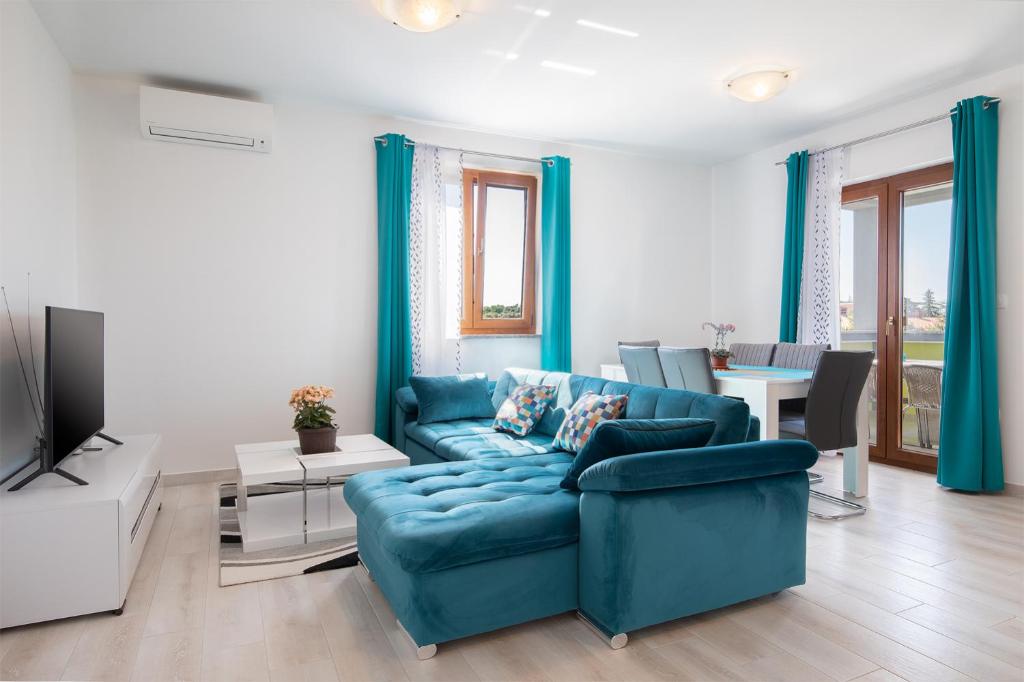 Posezení v ubytování Kaylie Apartment