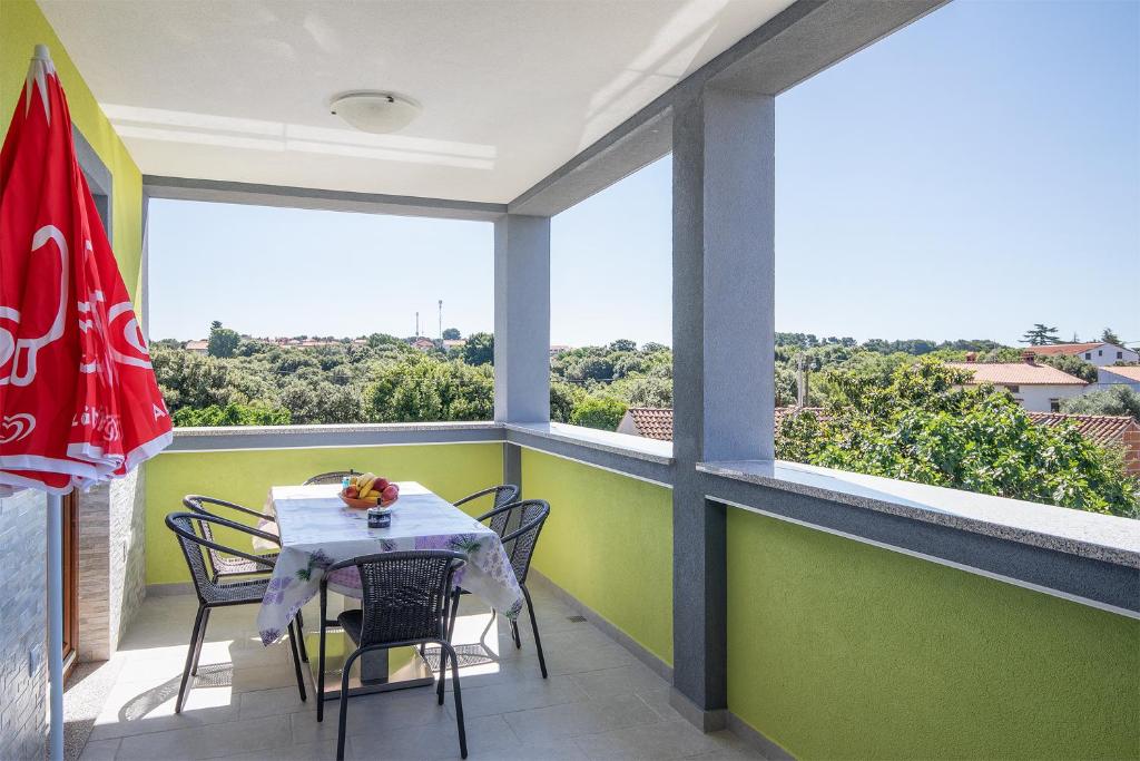 Balkón nebo terasa v ubytování Kaylie Apartment