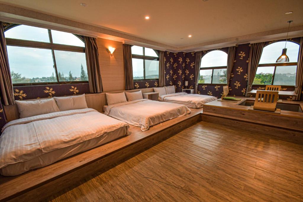 Postel nebo postele na pokoji v ubytování Jinsa Lakeside View Resort
