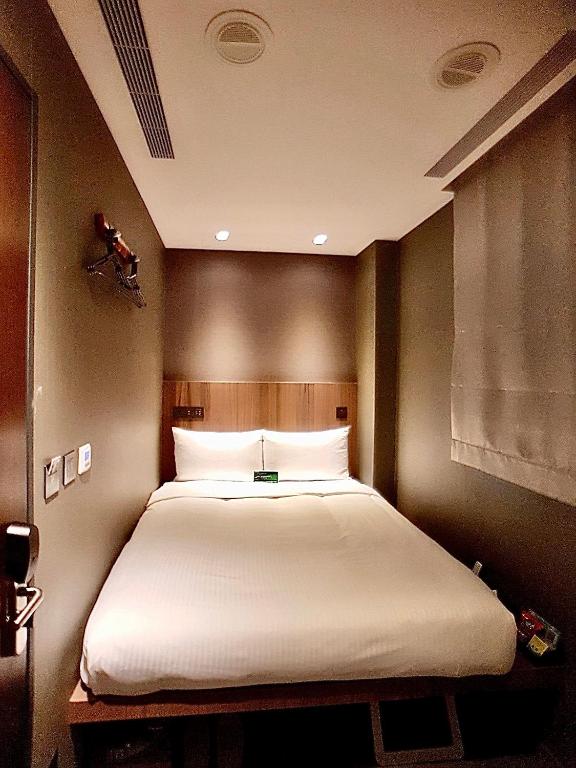 Postel nebo postele na pokoji v ubytování Beauty Hotels Taipei - B7 Journey