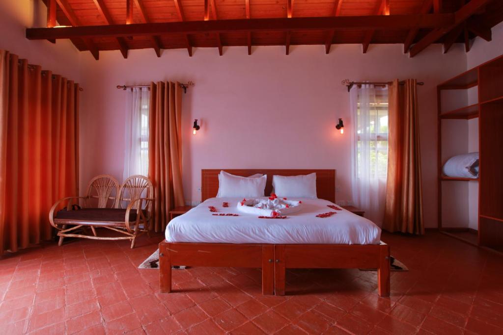 Säng eller sängar i ett rum på Mtoni Resort, Naro moru