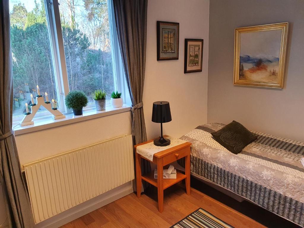 Postel nebo postele na pokoji v ubytování Brukshotellet Skinnsberg