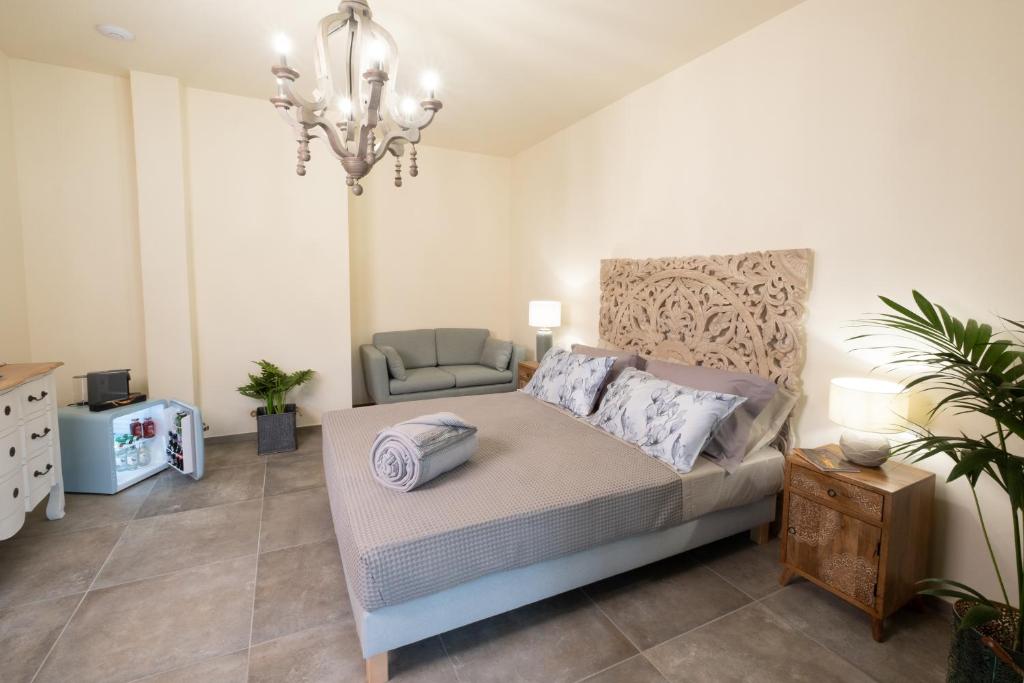 Postel nebo postele na pokoji v ubytování Relais San Baio