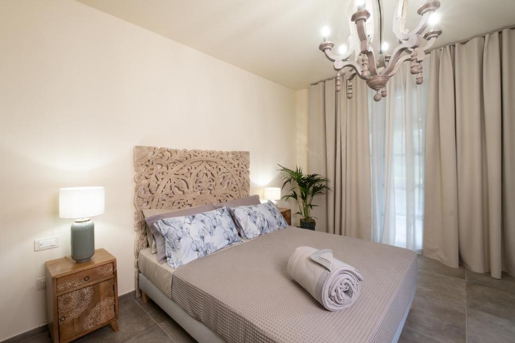 Postel nebo postele na pokoji v ubytování Relais San Baio