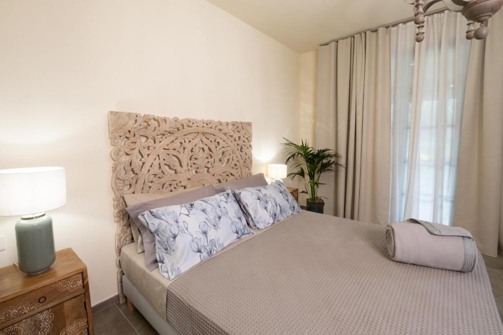Postel nebo postele na pokoji v ubytování Relais San Baio