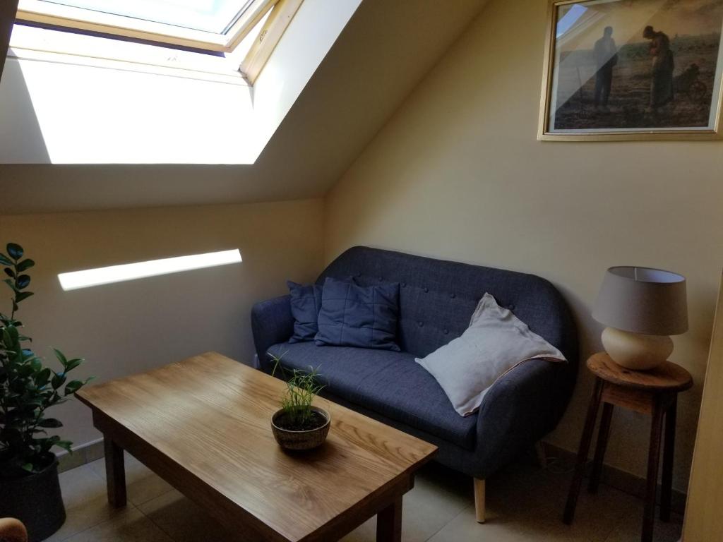 Posezení v ubytování chambre d'hôtes de charme, un temps en forêt