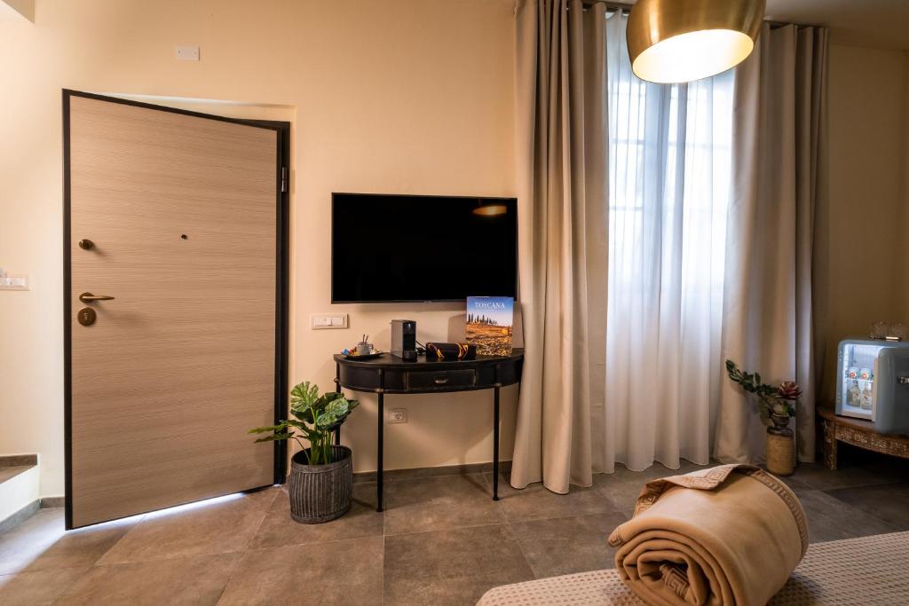 TV a/nebo společenská místnost v ubytování Relais San Baio