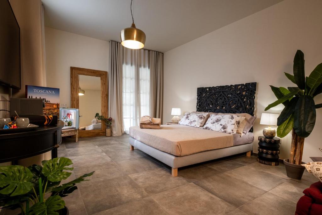 Postel nebo postele na pokoji v ubytování Relais San Baio