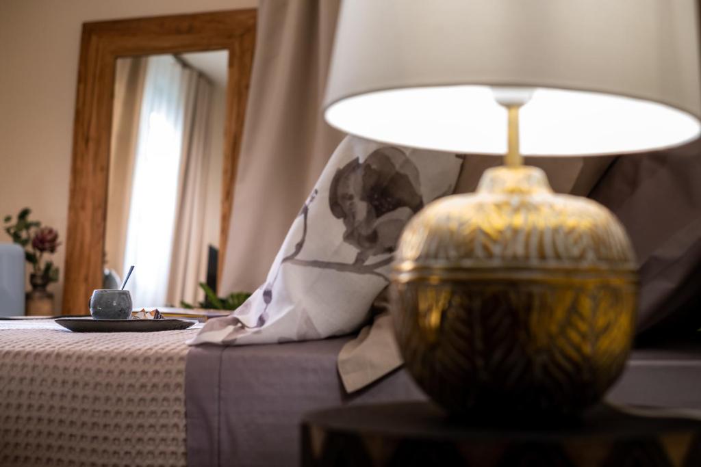 Postel nebo postele na pokoji v ubytování Relais San Baio