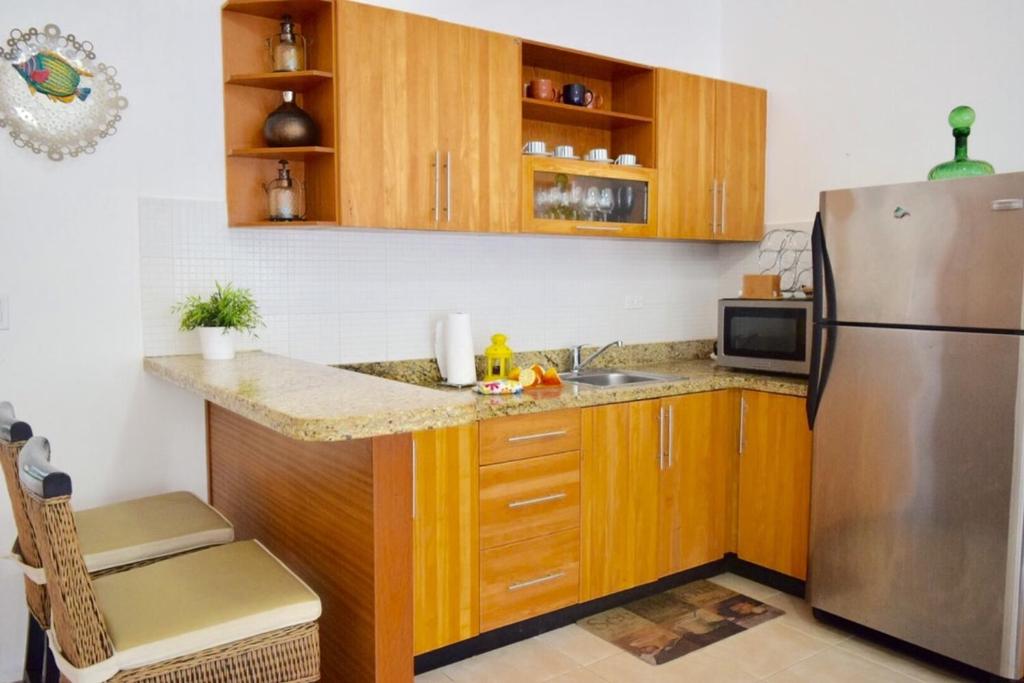 Kuchyň nebo kuchyňský kout v ubytování 3BR Apt @CadaquesCaribe Bayahibe