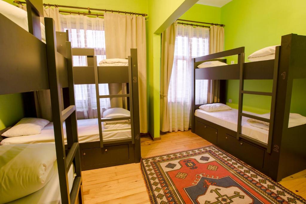 Postel nebo postele na pokoji v ubytování Cheers Hostel