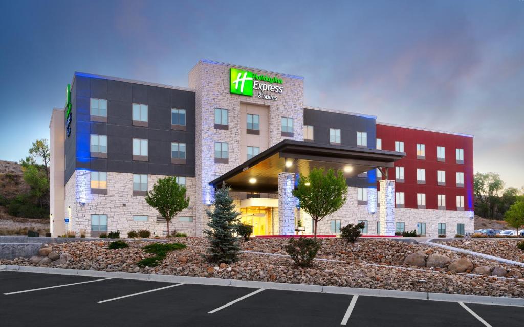 ariott hotel with a parking lot in front of it at Holiday Inn Express & Suites Price, an IHG Hotel in Price