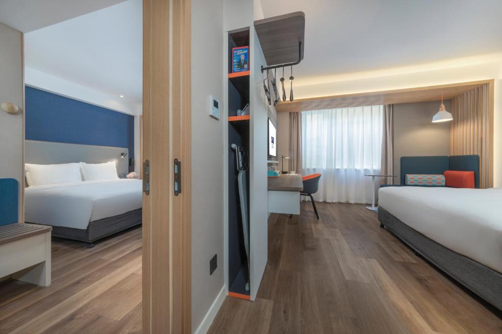 Postel nebo postele na pokoji v ubytování Holiday Inn Express Shanghai Jiading Center by IHG