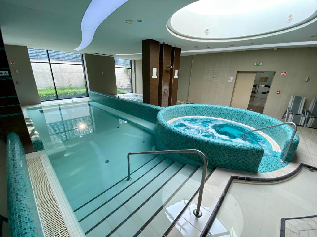 Bazén v ubytování Imola Hotel Platán nebo v jeho okolí