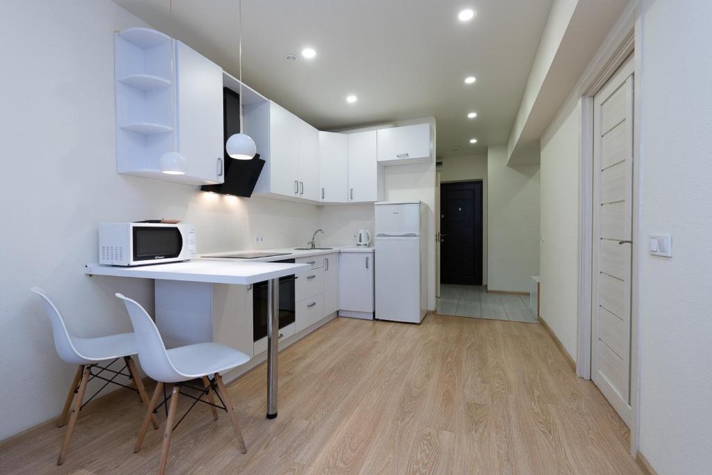 Kuchyň nebo kuchyňský kout v ubytování FlatRent SmartHouse