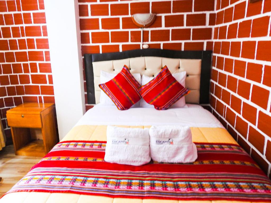 Postel nebo postele na pokoji v ubytování Hostal Encanto Machupicchu
