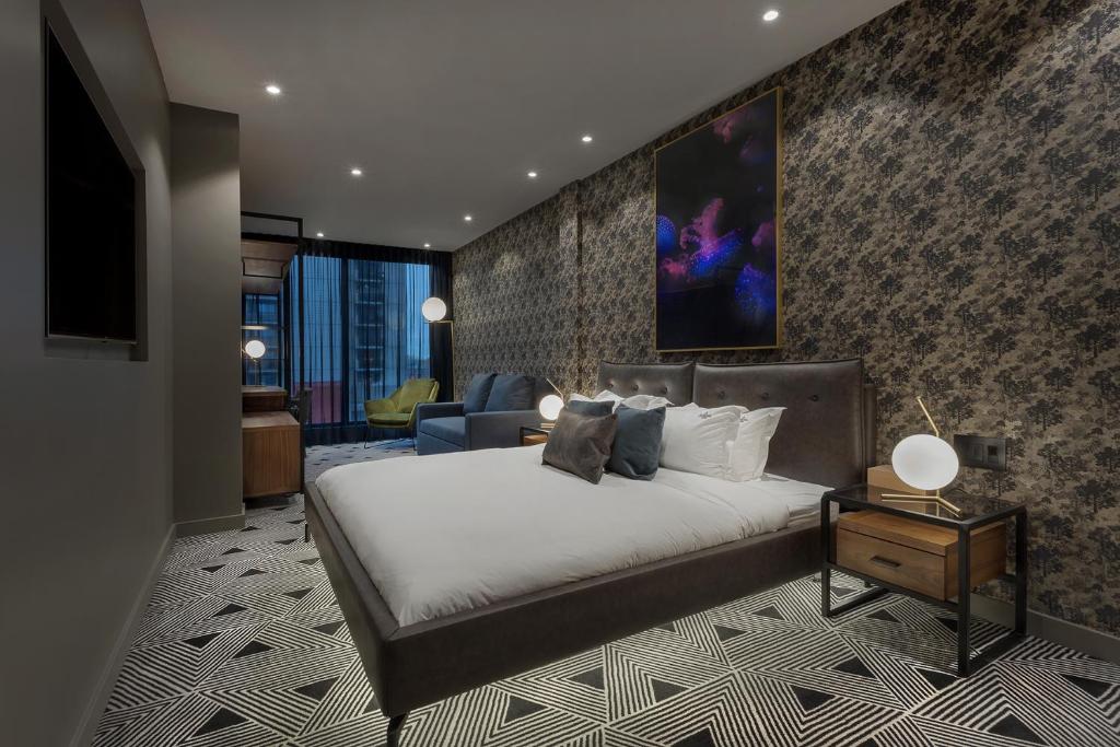 Postel nebo postele na pokoji v ubytování Hotel St.Thomas
