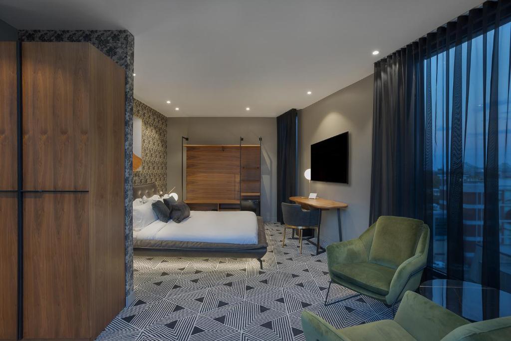 Postel nebo postele na pokoji v ubytování Hotel St.Thomas