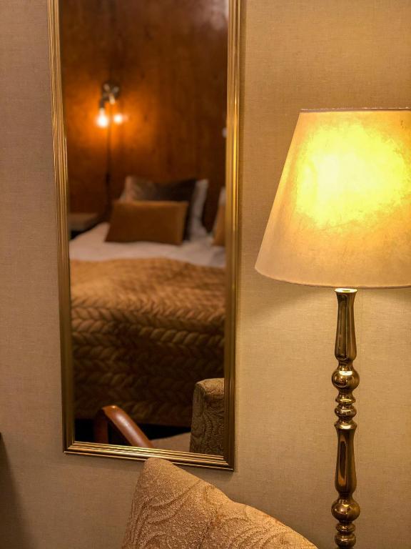 Postel nebo postele na pokoji v ubytování Villa Bergli