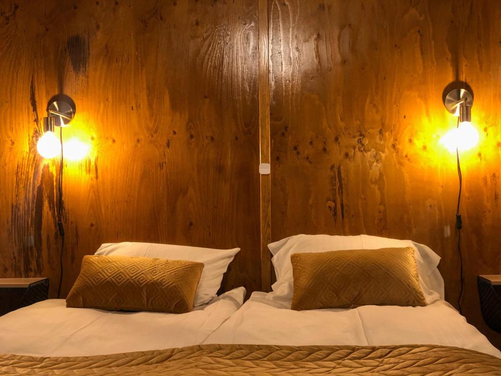 Postel nebo postele na pokoji v ubytování Villa Bergli