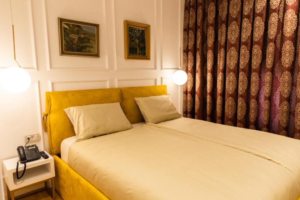 Postel nebo postele na pokoji v ubytování Star Hill Hotel & Spa