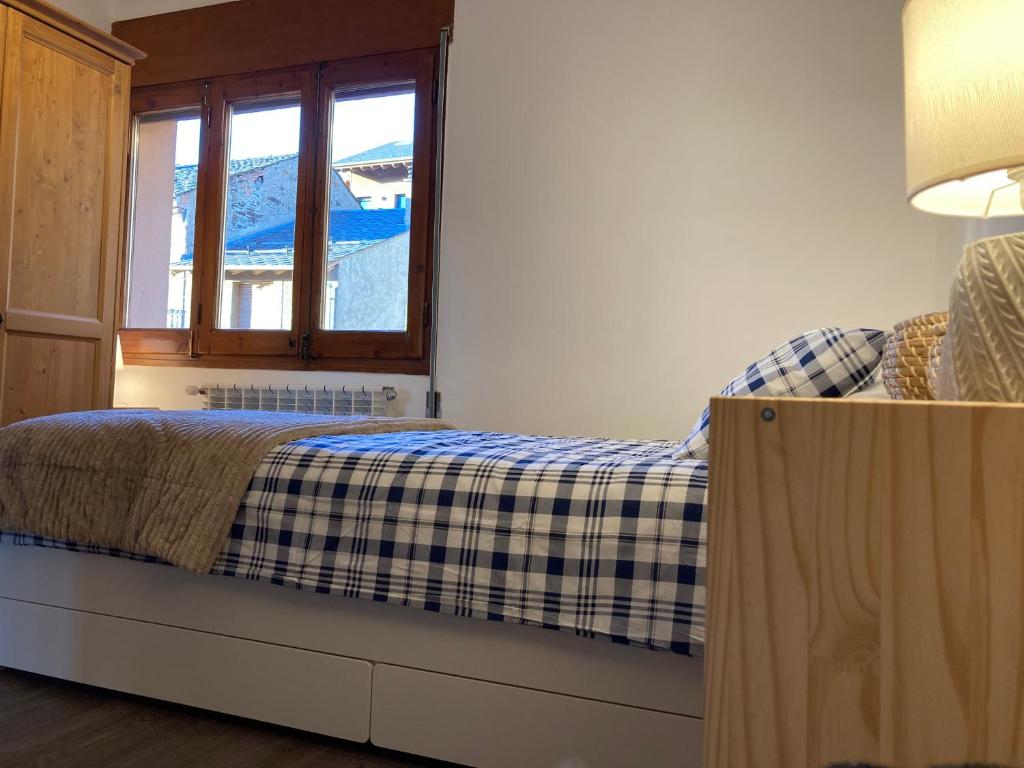 Postel nebo postele na pokoji v ubytování Vistas Únicas a los Pirineos, para 7-8 personas!! Tensi Home Llivia