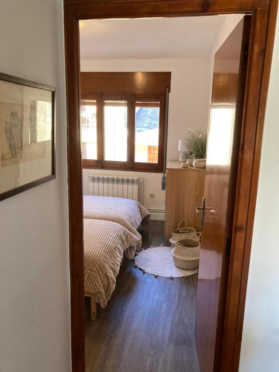 Postel nebo postele na pokoji v ubytování Vistas Únicas a los Pirineos, para 7-8 personas!! Tensi Home Llivia