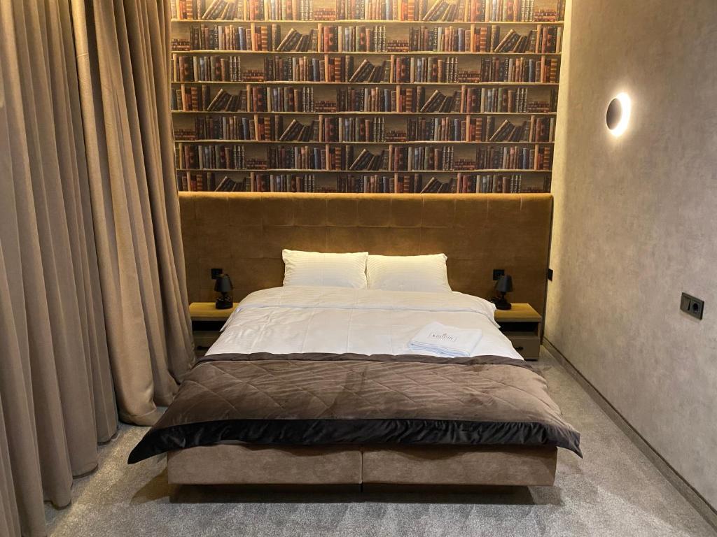 Postel nebo postele na pokoji v ubytování Kuprin Hotel