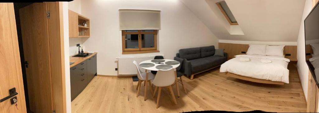 Postel nebo postele na pokoji v ubytování Apartmány Hacienda Boží Dar