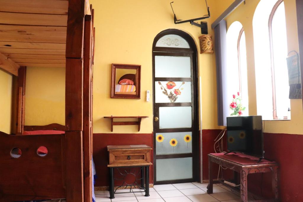 TV a/nebo společenská místnost v ubytování Hostel Casa Zalaoui