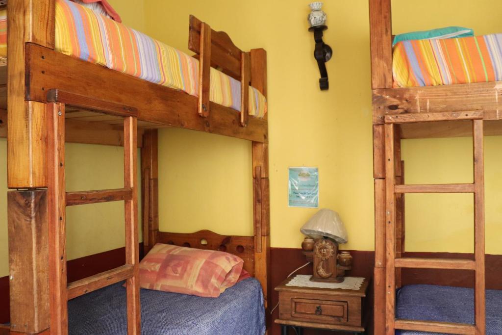 Postel nebo postele na pokoji v ubytování Hostel Casa Zalaoui