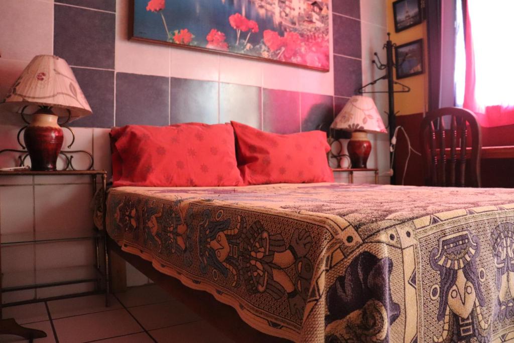 Postel nebo postele na pokoji v ubytování Hostel Casa Zalaoui