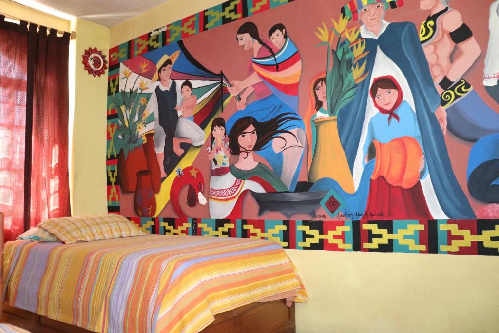 Postel nebo postele na pokoji v ubytování Hostel Casa Zalaoui