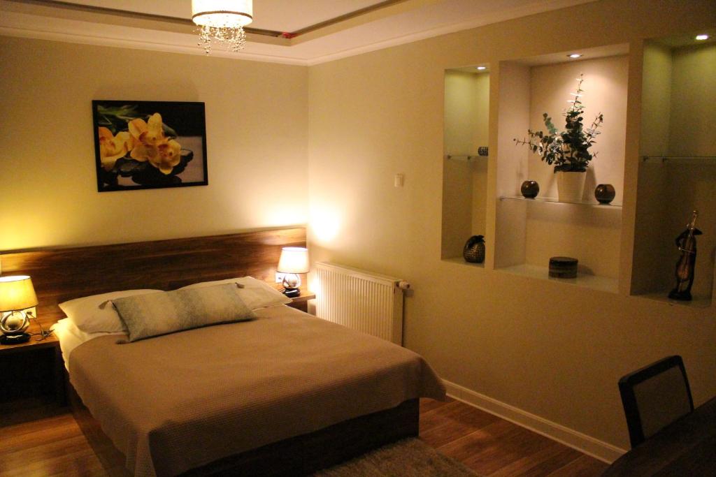 Posteľ alebo postele v izbe v ubytovaní PIANO CAFE b&b