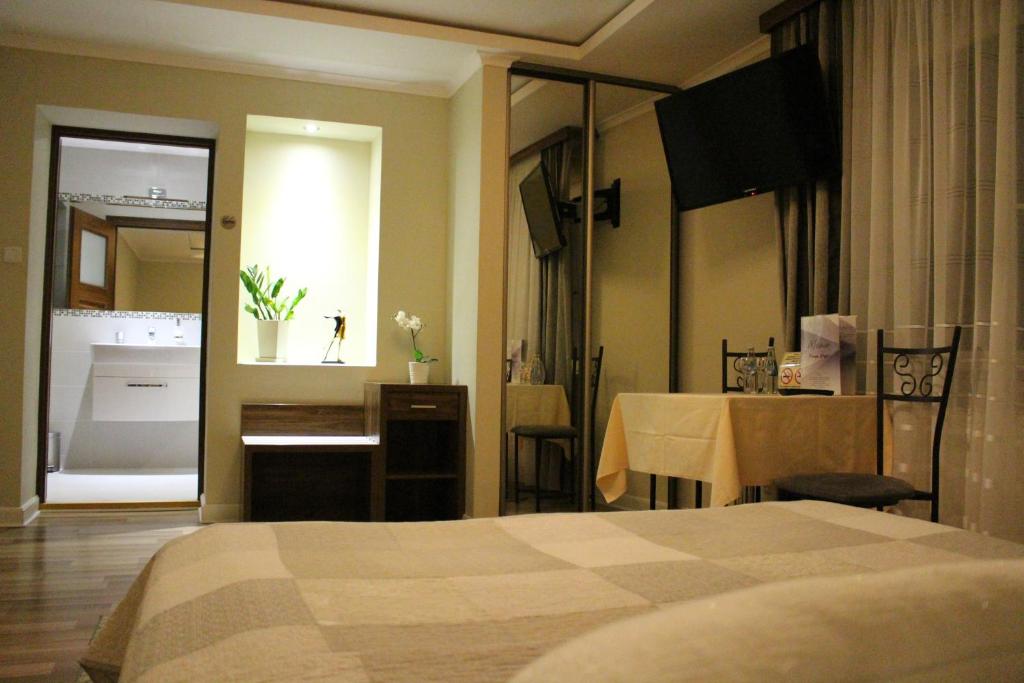 Posteľ alebo postele v izbe v ubytovaní PIANO CAFE b&b