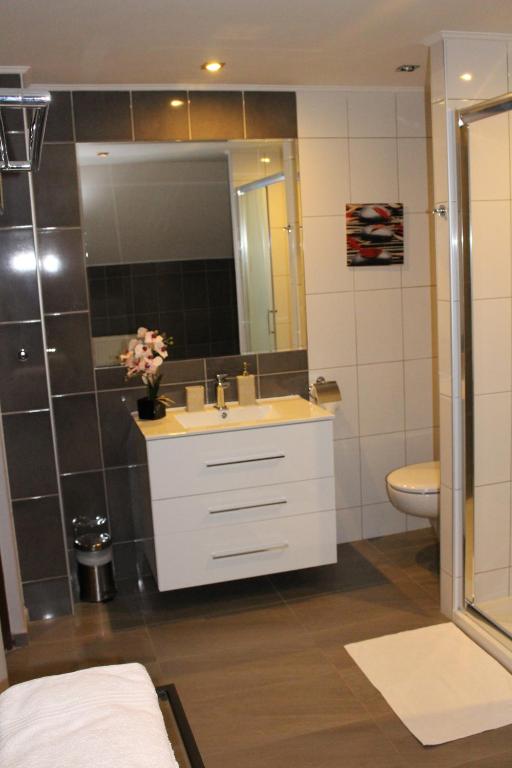 Kúpeľňa v ubytovaní PIANO CAFE b&b