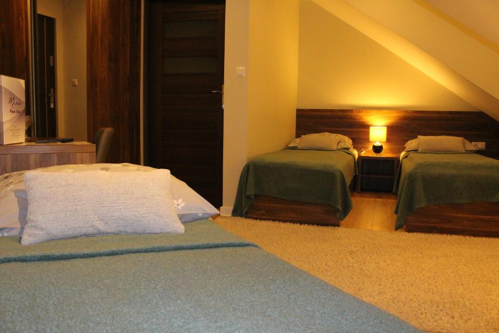 Posteľ alebo postele v izbe v ubytovaní PIANO CAFE b&b