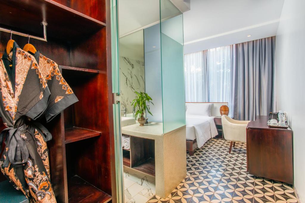 Postel nebo postele na pokoji v ubytování UTEY Hotel
