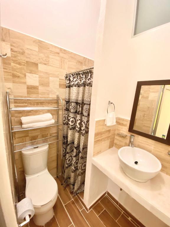 Koupelna v ubytování Hotel Universidad