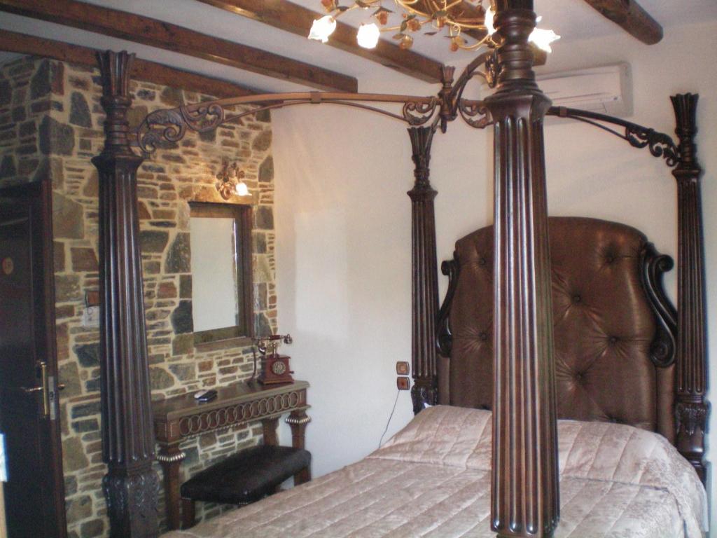 Postel nebo postele na pokoji v ubytování Nikolaou House