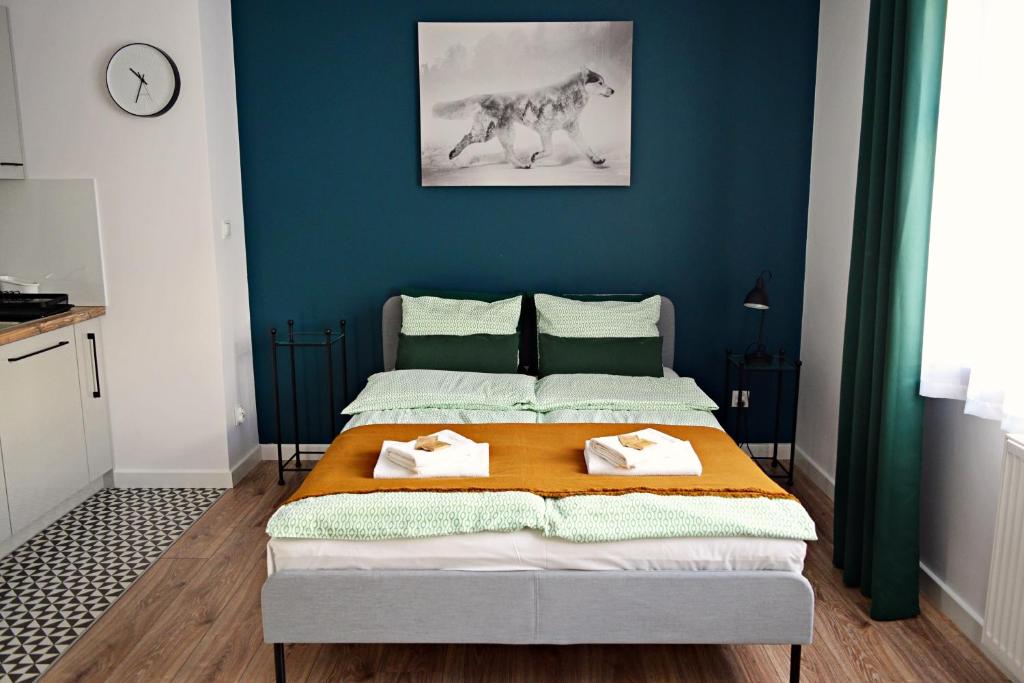 Posteľ alebo postele v izbe v ubytovaní ForRest Apartment Krynica