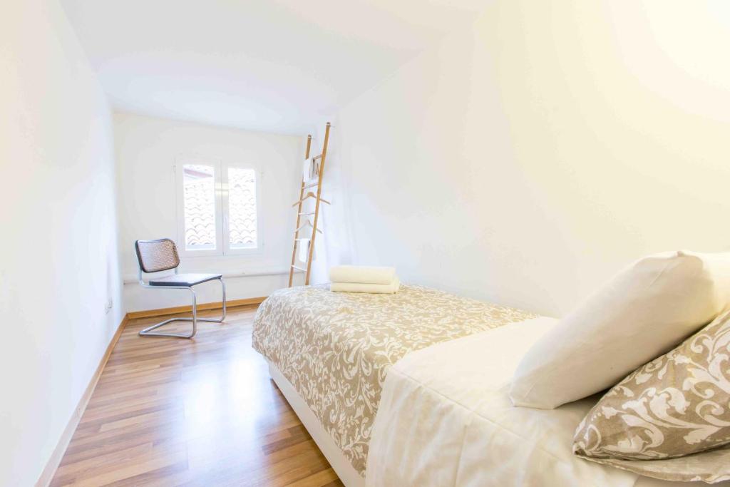 Łóżko lub łóżka w pokoju w obiekcie CA GRIMANI private terrace