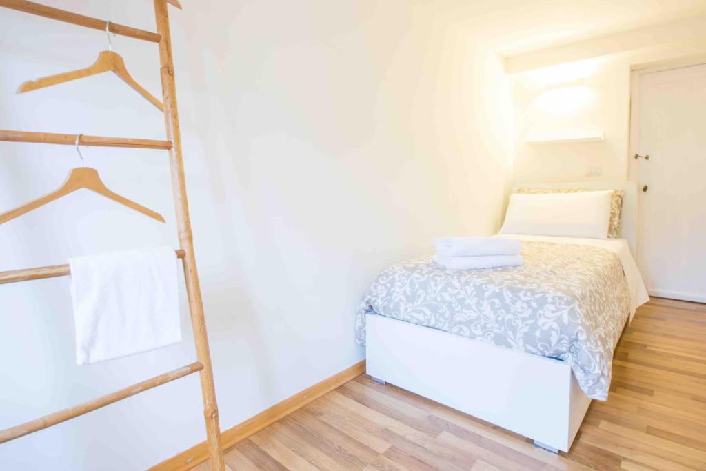 Łóżko lub łóżka w pokoju w obiekcie CA GRIMANI private terrace