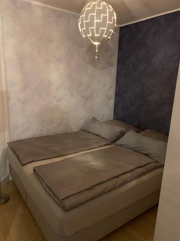 Postel nebo postele na pokoji v ubytování Mini-Ferien-Suite Hildesheim