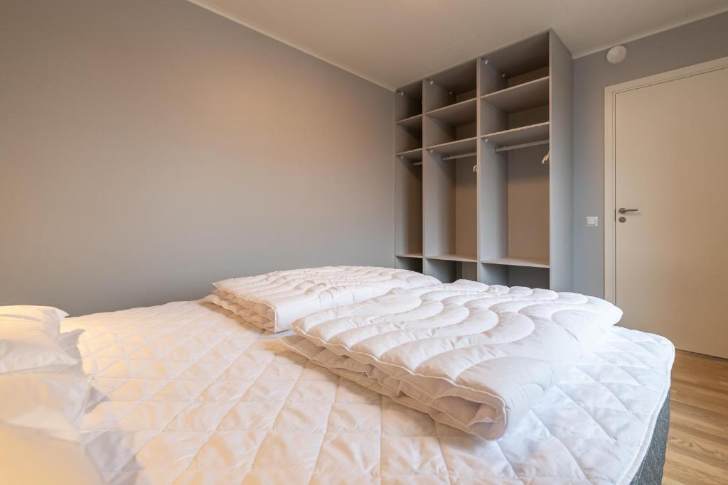 Кровать или кровати в номере Hotell Kurbits