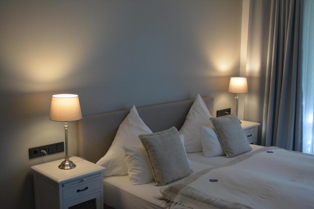 Postel nebo postele na pokoji v ubytování Hotel Leegerpark